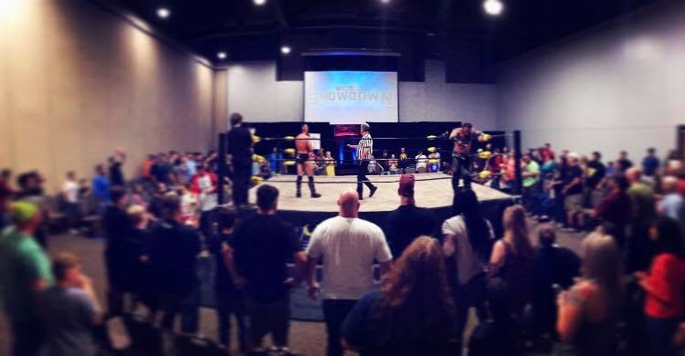 The audience surrounds the ring at Showdown Redemption, August 2019